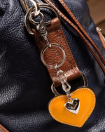 Schlüsselanhänger mit Lederherz und Schmuckherz in Orange - RIEMTEX